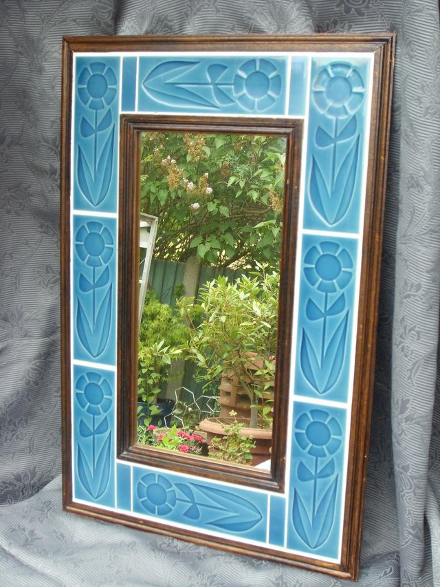 Preview of the first image of Vintage Mirror With Blue Tile Frame.