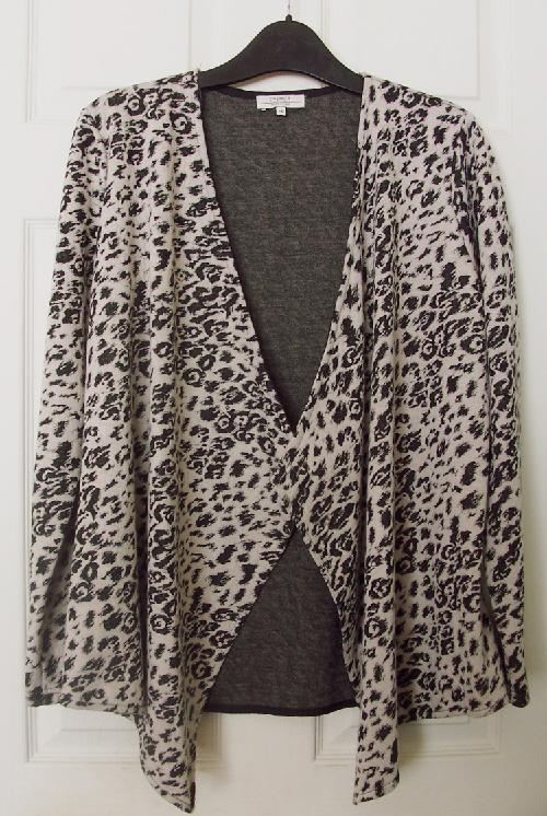Preview of the first image of Ladies Black/Beige Printed Waterfall Cardigan - Sz 14.   B3.