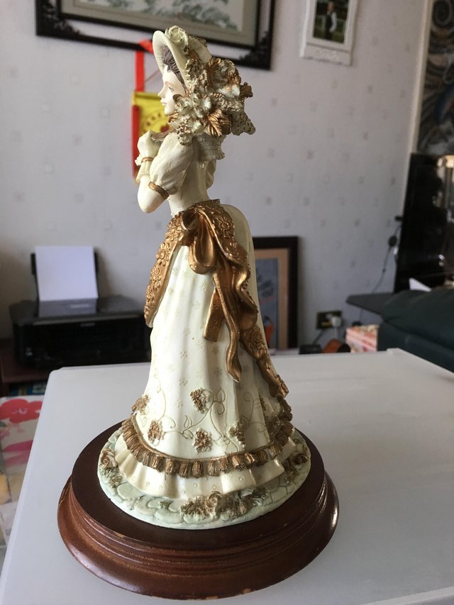 Preview of the first image of Antique lady ornament.