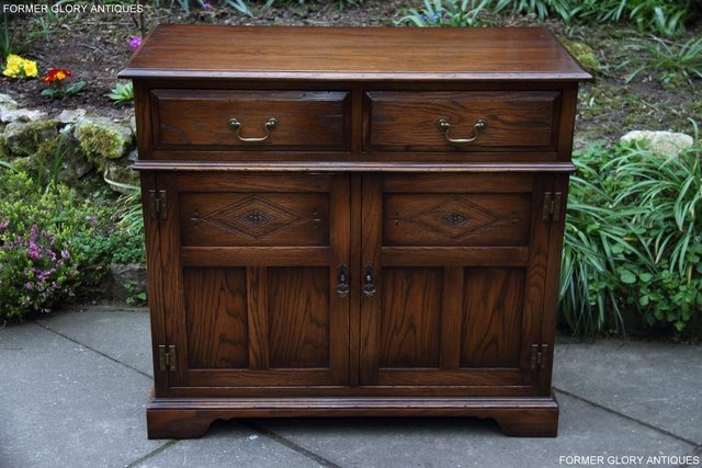 Preview of the first image of BEVAN FUNNELL OAK DRESSER BASE SIDEBOARD HALL TABLE CABINET.