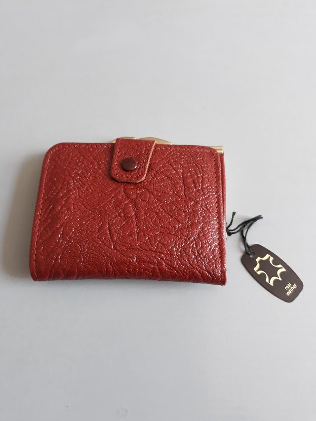 Preview of the first image of Ladies  leather purse.