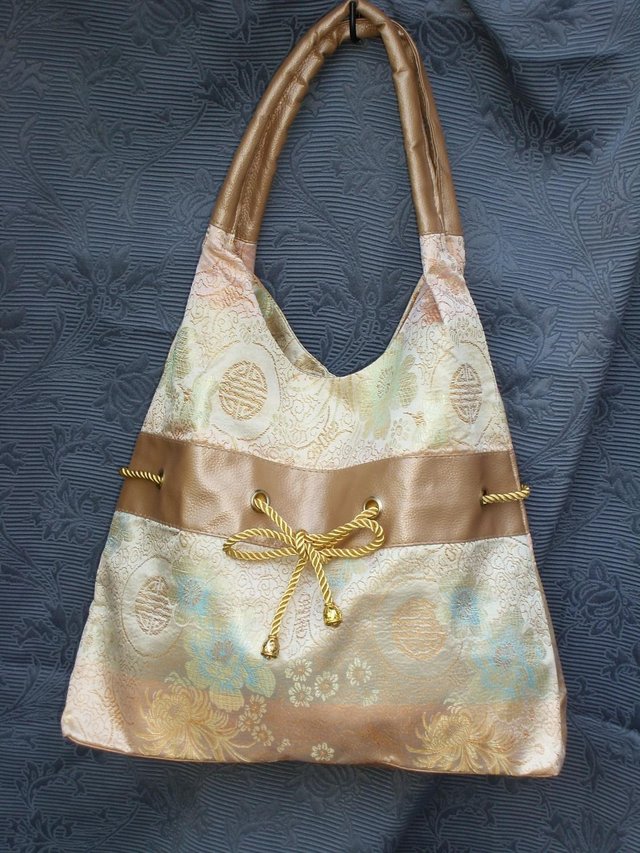 Preview of the first image of Oriental Style Gold Silk Shoulder Bag NEW.
