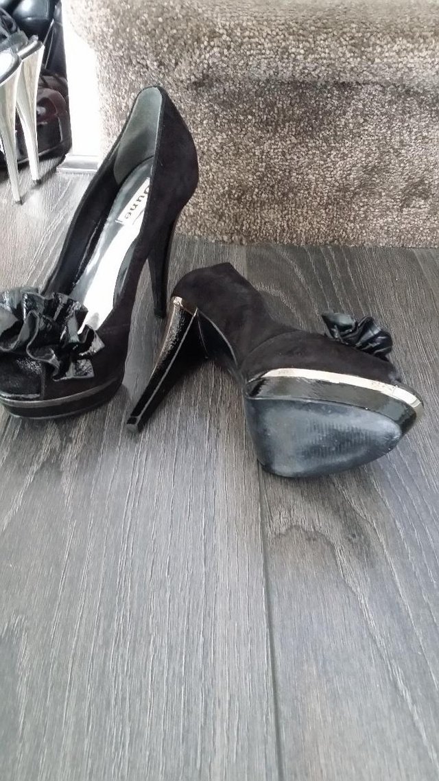 Preview of the first image of Stylish Ladies Black Suede Stilettos - Size 36EU.
