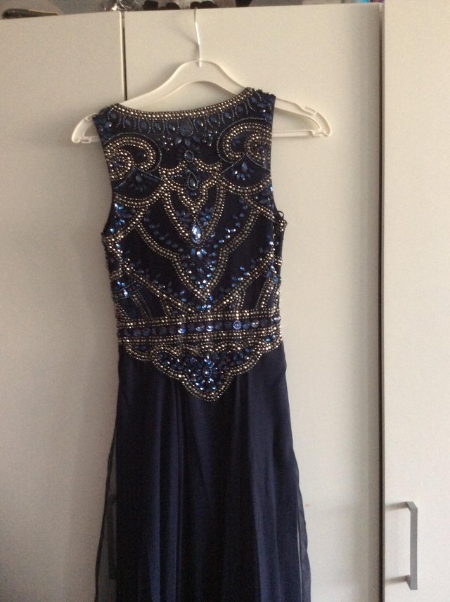Preview of the first image of Navy blue ,sequin Prom dress.