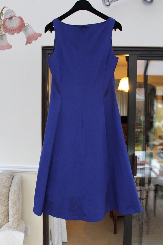 Preview of the first image of House of Fraser Untold clothing Midnight blue dress size 12.