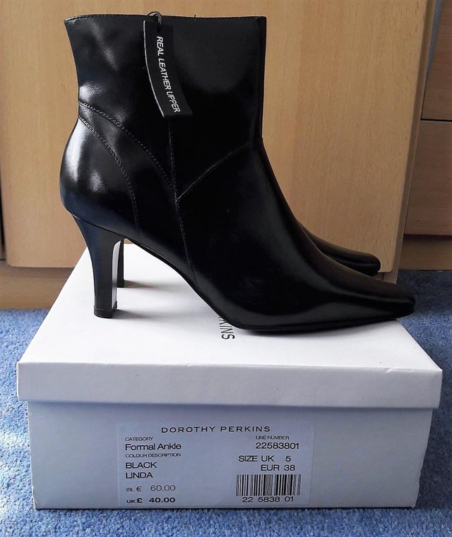 Preview of the first image of Dorothy Perkins women's black leather ankle boots size 5.