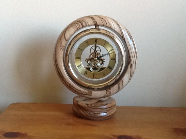Preview of the first image of Zebra wood clock.