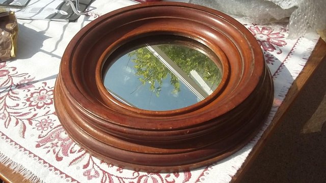 Preview of the first image of Antique Solid Mahogany Deep Round Framed Mirror.