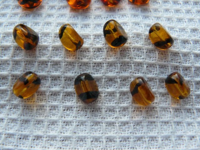 Image 4 of 15 antique amber/black stripe glass tiger beads Mixed sizes