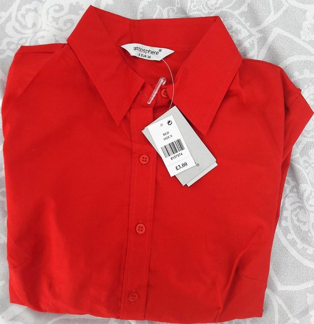 Preview of the first image of Primark long sleeve bright red shirt size 8.