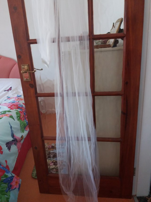Preview of the first image of Wedding dress veil and dress bag.
