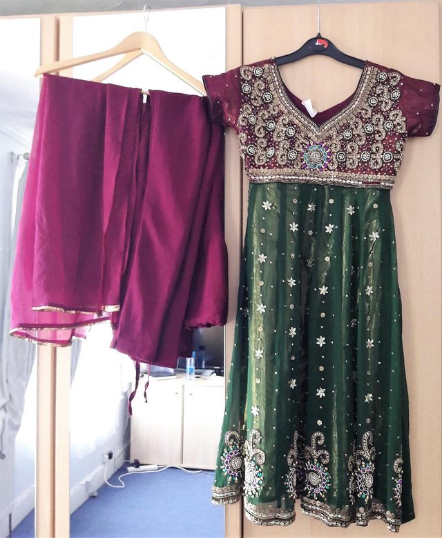 Preview of the first image of Indian 3 piece punjabi suit purple and green.