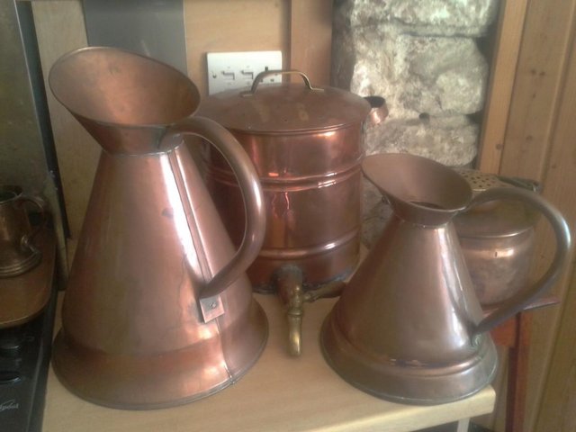 Preview of the first image of Copper water urn and 2 large copper jugs.