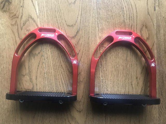 Preview of the first image of BNIB Red/Black Jins stirrups.
