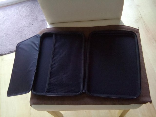 Preview of the first image of Tablet case. New never used. Great condition.