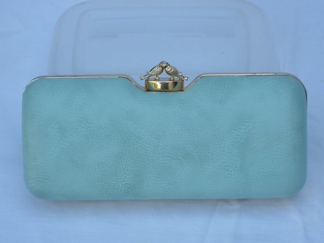 Preview of the first image of ACCESSORIZE Mint Green Hard Shell Handbag/Clutch.