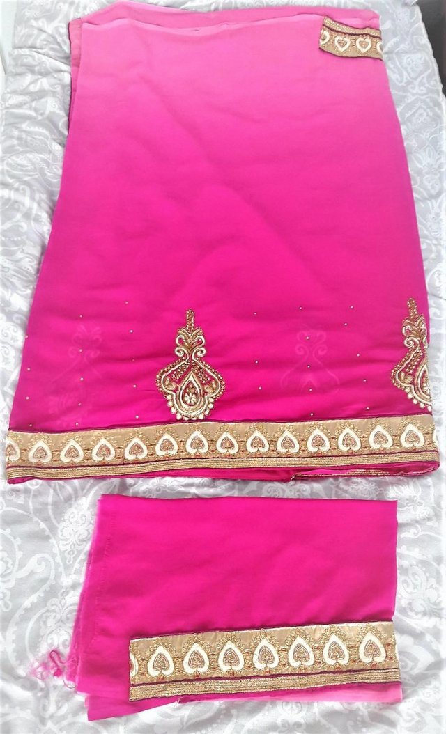 Preview of the first image of Indian saree - 2 tone pink and gold design with blouse piece.