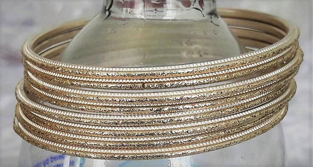 Preview of the first image of Indian bangles - gold sparkly x 8.
