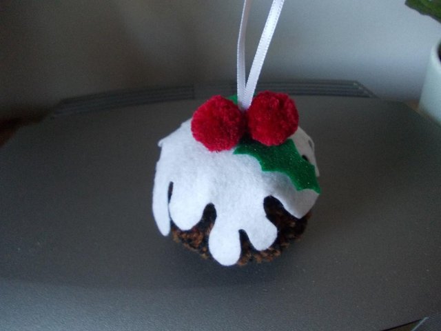 Preview of the first image of HANDMADE CHRISTMAS PUD POM POM.