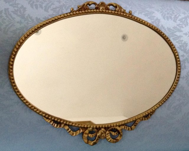 Preview of the first image of Oval Antique Mirror in a metal frame 45 x 57 cm.