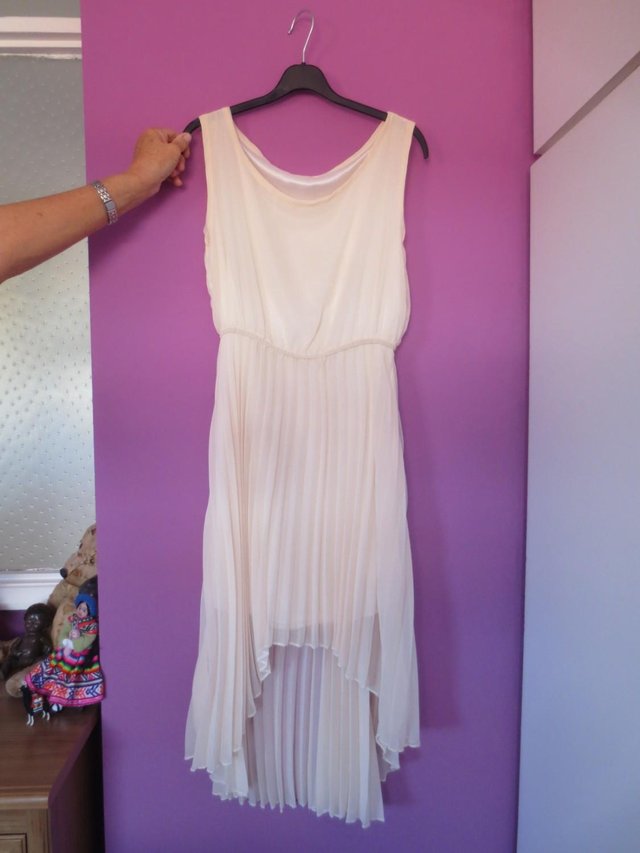 Preview of the first image of Brand New. Never been worn. Beautiful sheer dress.