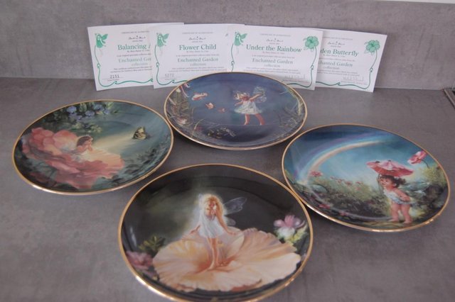 Image 1 of 4 plates from danbury mint enchanted garden collection