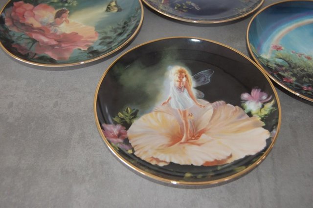 Image 2 of 4 plates from danbury mint enchanted garden collection