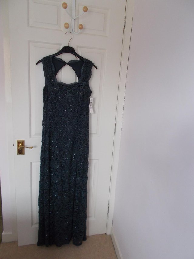 Preview of the first image of R & M Richards lace gown, charcoal grey, still labelled..