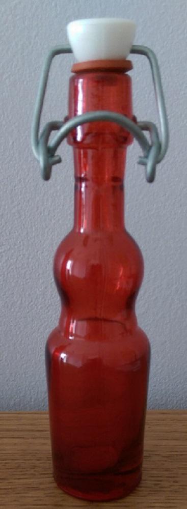 Preview of the first image of Various red glass bottles/ornaments - various prices.