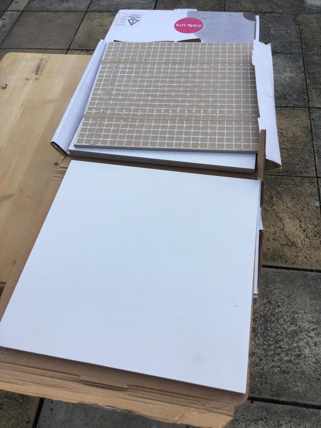 Preview of the first image of Tiles - White floor tiles brand new in boxes.