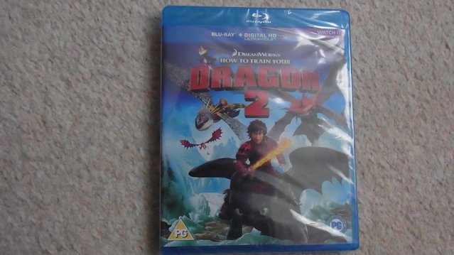 Preview of the first image of Sealed, unopened Blu-ray How to train your dragon 2 (PG).