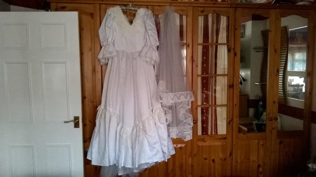 Preview of the first image of Wedding Dress-white with veil, netting underskirt & 3xgarter.