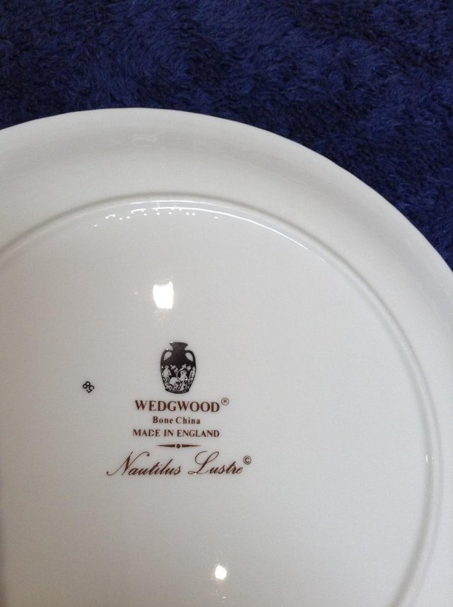 Preview of the first image of Wedgwood Bone China Nautilus Lustre plate.