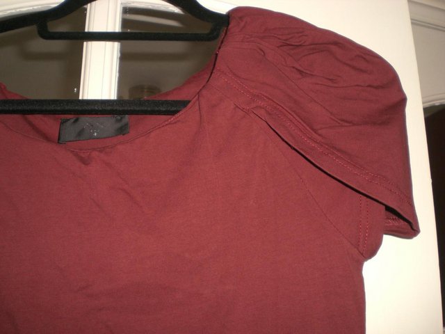 Preview of the first image of Ladies Dark Red Top with Cap Sleeves, size 14.