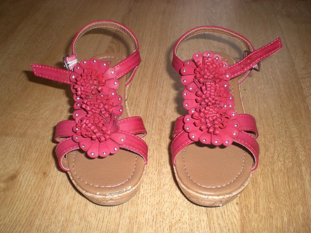 Preview of the first image of Girls Red Strappy Sandals with Small Heel, size 1.