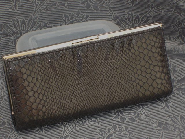 Preview of the first image of DEFINITIONS Black Snap Top Clutch Bag NEW WITH TAGS.