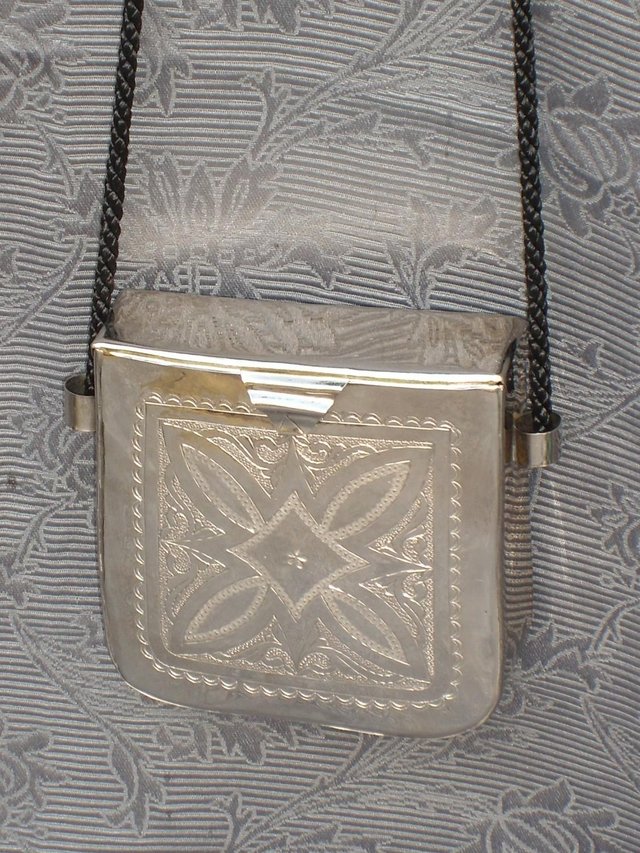 Preview of the first image of Boho Embossed Metal Bag.