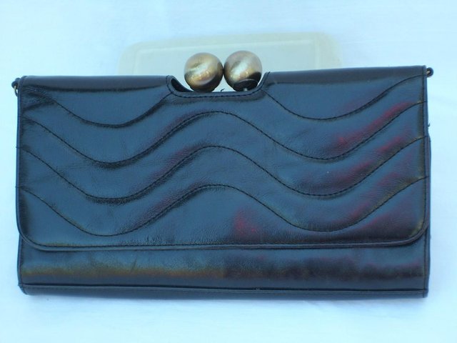 Preview of the first image of JANE SHILTON Black Leather Clutch + Shoulder Strap.