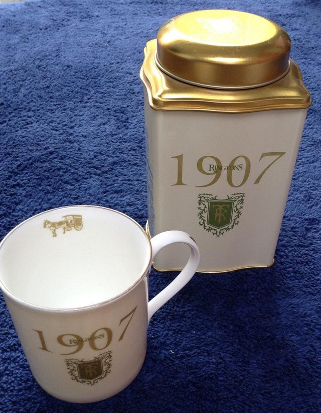 Preview of the first image of Rington's centenary mug and matching tin tea caddy.