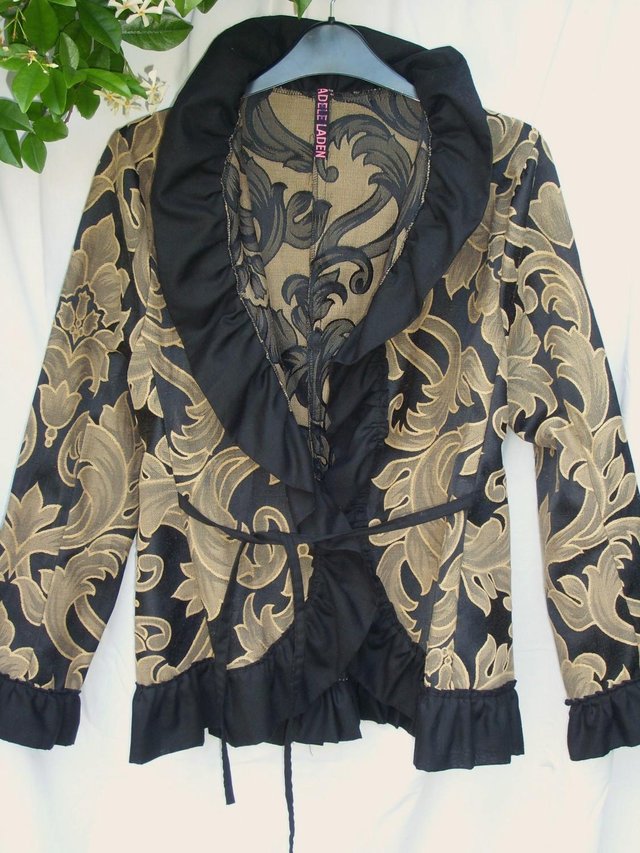 Preview of the first image of ADELE LADEN Black/Gold Frilled Jacket Size 10 NEW.