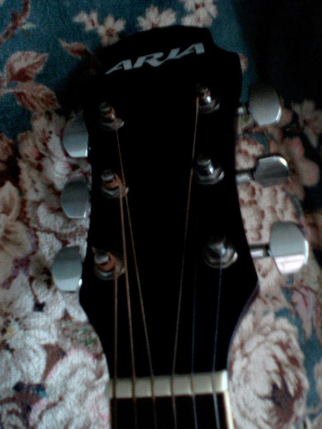 Preview of the first image of ARIA QUALITY ACUSTIC GUITAR NOT USED MUCH.