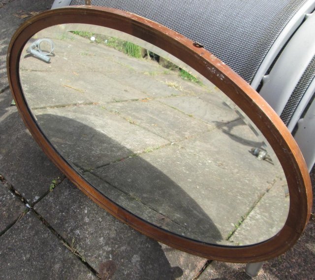 Preview of the first image of Vintage Bevel Edge Mirror in wooden frame.