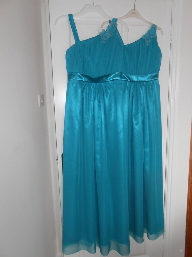 Image 2 of 2 stunning Turquoise (unworn) early-teen Bridesmaid dresses