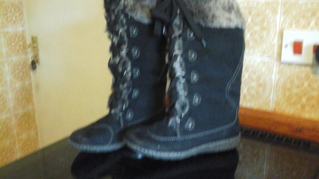 Preview of the first image of Fur biker boots.