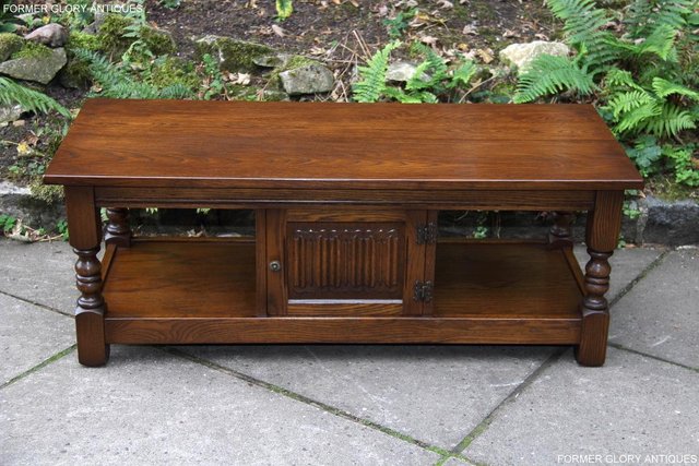 Preview of the first image of OLD CHARM LIGHT OAK LONG COFFEE WINE TABLE CABINET TV STAND.