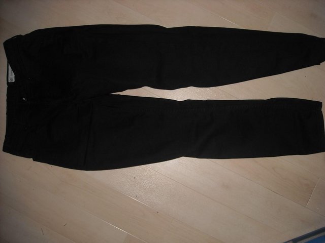 Preview of the first image of Lee Jeans Boy's black skinny fit jeans age 14-15.