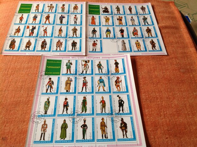 Preview of the first image of 56 stamps in 3 sheets of Ajman state - military Uniforms.