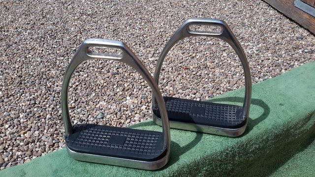 Preview of the first image of Quality elegant stirrup irons 4 1/2inch with rubber treads.