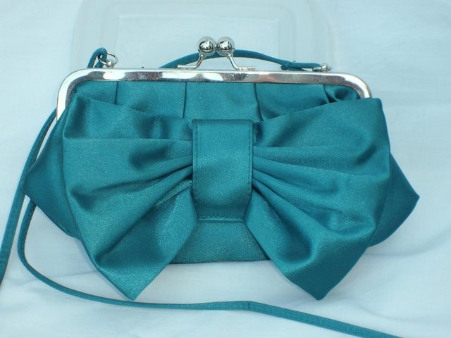 Preview of the first image of NEW LOOK Green Cross Body Bow Bag NEW.