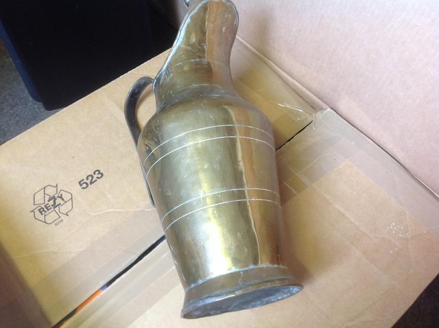 Preview of the first image of Large heavy brass jug in good condition.